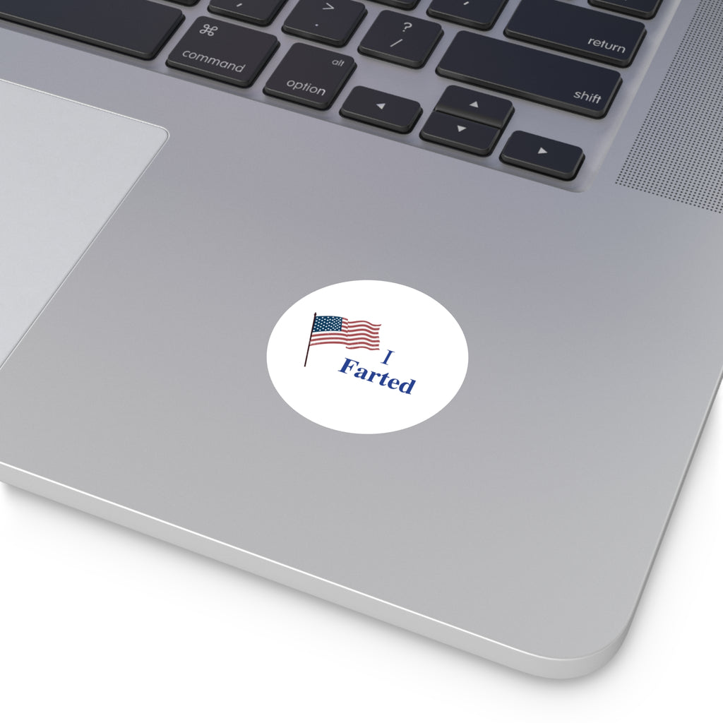Sticker with 'I Farted' text and American flag on a laptop