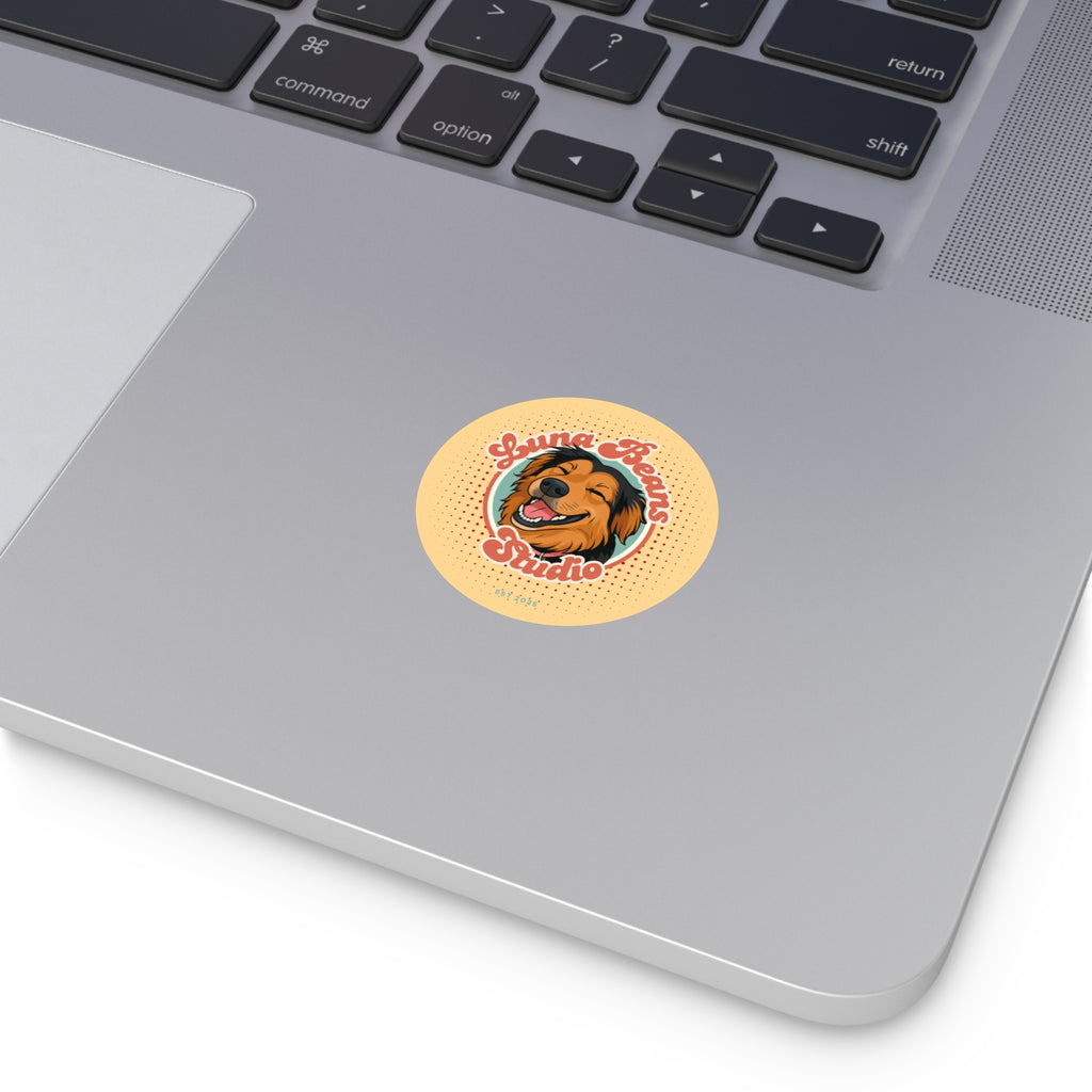 Laptop with a sticker of a dog on the palm rest area